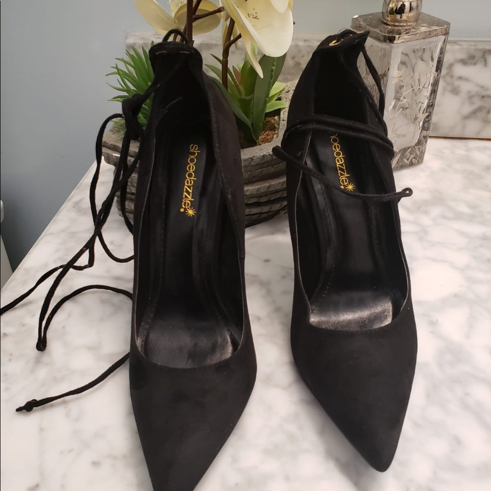 Black Heels with tie-up lace.